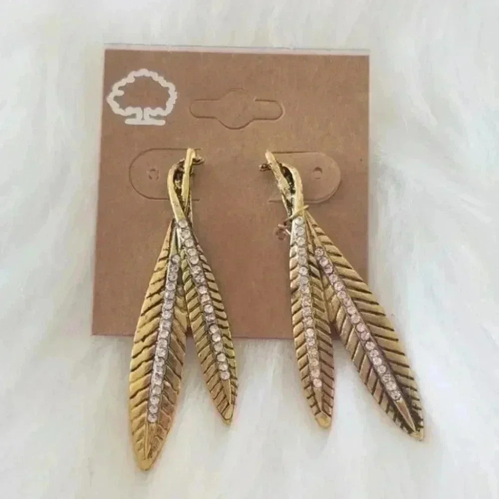 Gold toned rindstone feather earrings
